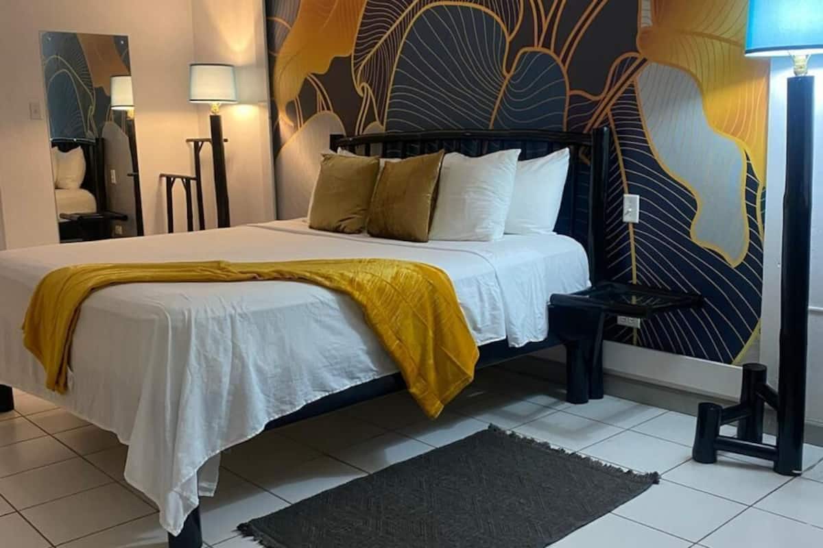 Chambre Ălite, 1 trĂšs grand lit, vue ocĂ©an