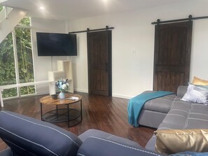 Deluxe Suite, Garden View | Living area | 50-inch TV with digital channels - LF Jungle Retreat (Port Antonio)