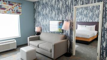 Suite, 1 chambre | Coin séjour