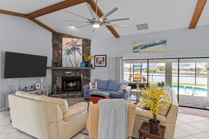 Smart TV, fireplace, books