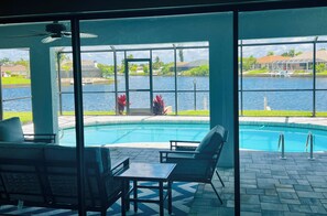 Outdoor pool, a heated pool - Luxury in Paradise-Beautiful Wide Water View-Dogs OK,Bikes,Kayaks, HeatedPool (Cape Coral)