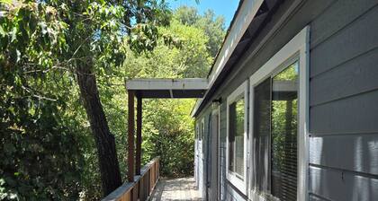 Peaceful retreat in the woods close to town