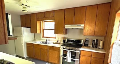 Cozy 3-bedroom cabin in Phillips on Soo Lake w/ WiFi, kayaks, fire pit & grill