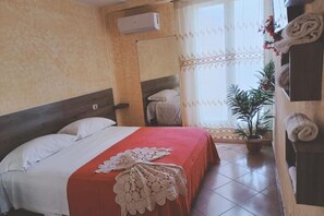 1 habitación, tabla de planchar con plancha, wifi y ropa de cama 