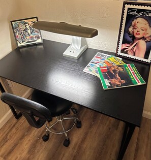 Work in comfort with a desk, chair, and ample space to stay productive.