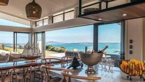 Dining - Tradewinds Estate by Waiheke Pure - Commanding views, pool, hot tub, grand open planned living, sun soaked decks (Waiheke Island)