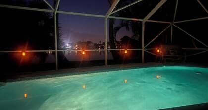 Charming 3-bedroom pool home on the lake with spectacular sunsets & close to all