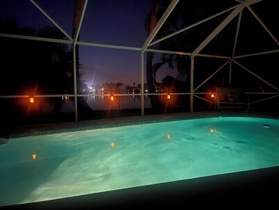 Charming 3-bedroom pool home on the lake with spectacular sunsets & close to all