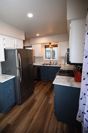 Fridge, microwave, oven, stovetop - Stampede Place- New listing! Pet Friendly, Stylish and Comfortable Home base (Cody)