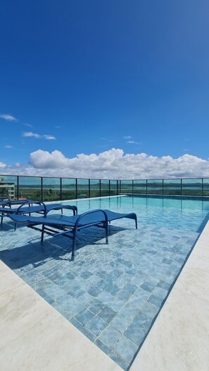 Outdoor pool, open 8:00 AM to 10:00 PM, pool umbrellas, sun loungers