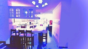 Basic Room | Living area - Budda Blue Hostel (Riobamba)