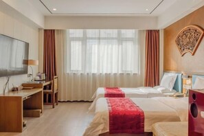 A hotel room with two beds, a TV, a desk, and a large window with curtains. - Wujia Yizhan Boutique Inn (Zhengzhou)