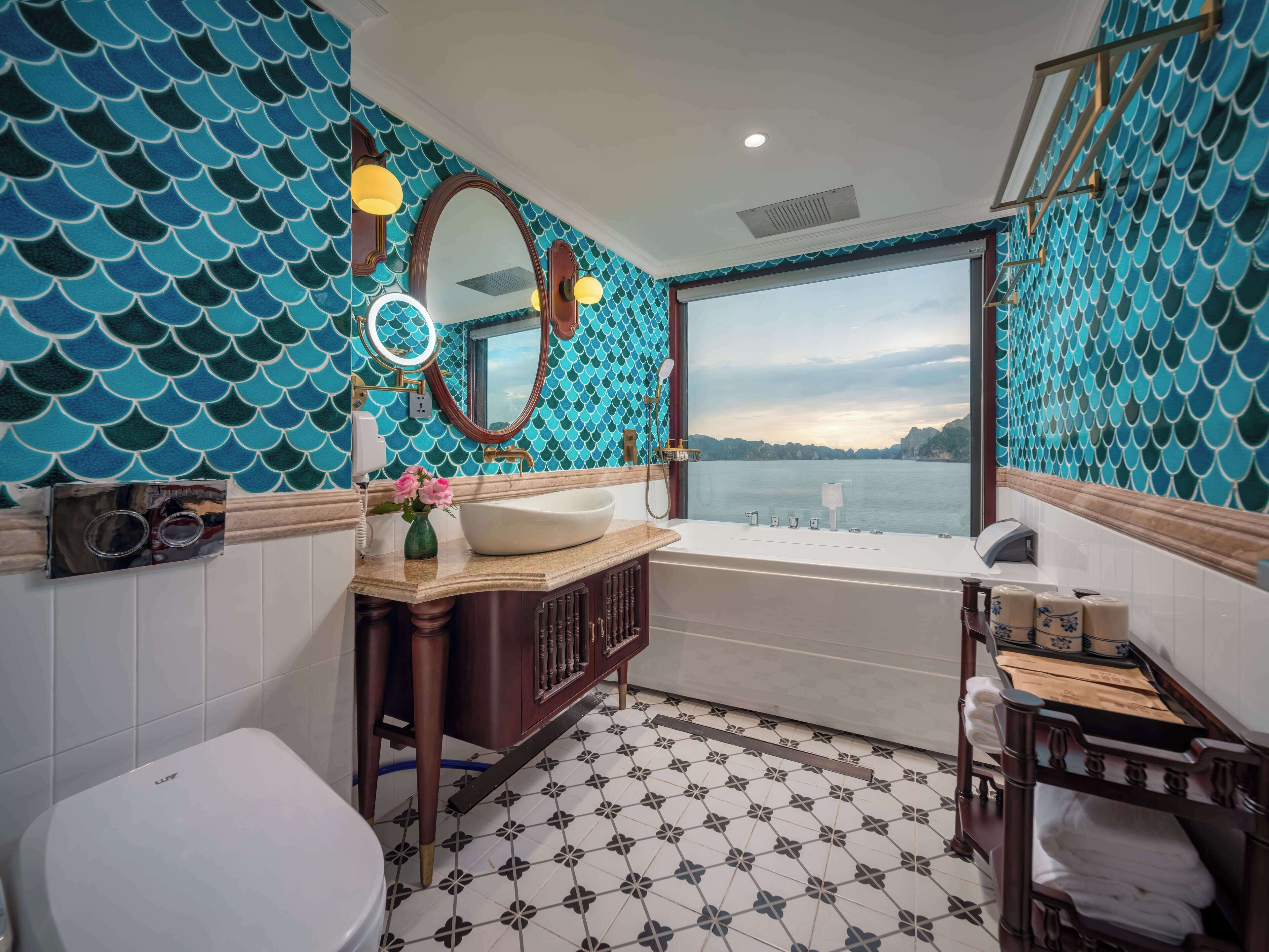 A bathroom with a bathtub, a sink, and a toilet.