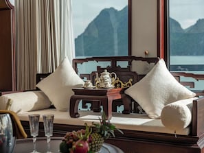 Royal Palace Cabin | Living room | 30-inch flat-screen TV with cable channels, TV, DVD player - L'amour Cruise (Ha Long)
