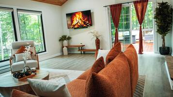 Smart TV, fireplace, foosball, books