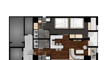 A floor plan of a hotel room with a kitchenette, a bathroom, a seating area with a sofa and a small table, and a window with curtains.