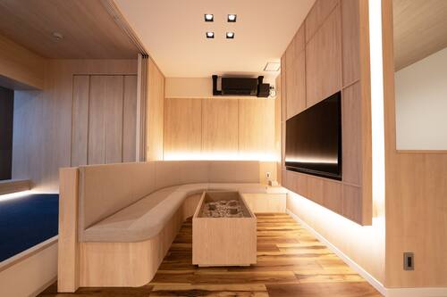 Premium bedding, desk, laptop workspace, soundproofing