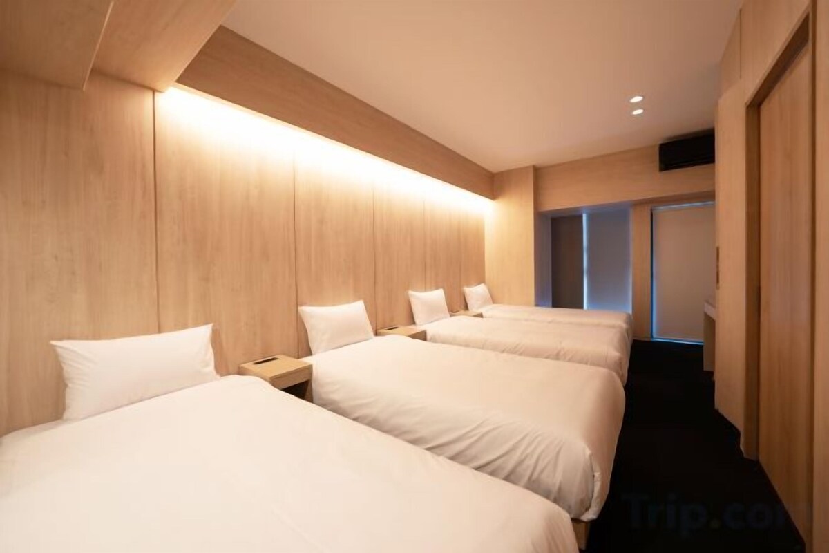 Premium bedding, desk, laptop workspace, soundproofing