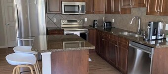 Entire Home in Edmonton South close to Airport with fenced private yard & deck
