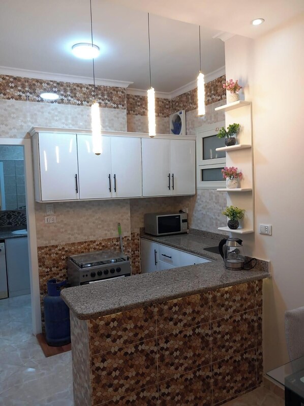 Fridge, microwave, oven, stovetop