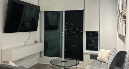 Luxurious High-Rise Condo with Stunning Waterfront Views