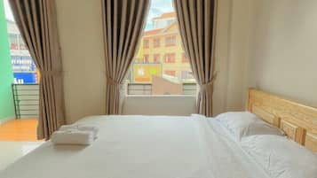 Standard Double Room, Garden View | Living area | TV