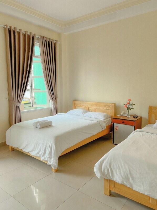 Standard Quadruple Room, City View