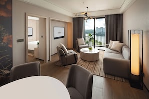 Deluxe Room, 2 Bedrooms | Living area | 55-inch TV with cable channels, iPod dock - Modena by Fraser Vĩnh Yên (Vinh Yen)