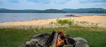 Spacious Lakefront cabin on Lake Chateaugay with private beach.