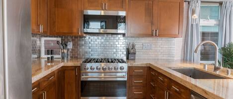 Dishwasher, coffee/tea maker, highchair, cookware/dishes/utensils