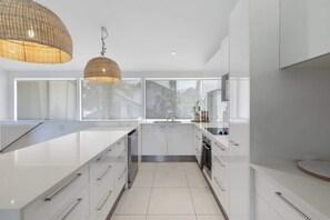 Coffee/tea maker, fridge, microwave, oven