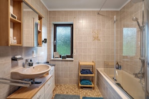 Shower, free toiletries, hair dryer, towels