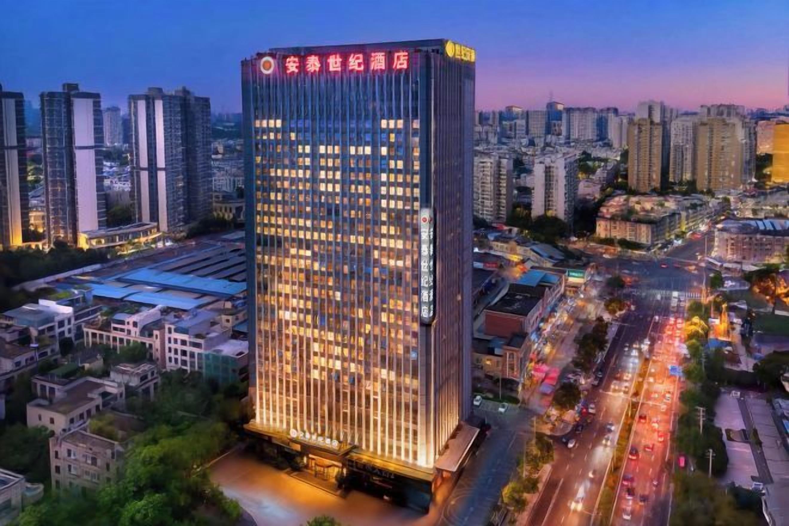 A high-rise hotel with a modern design, multiple floors, and a prominent entrance.