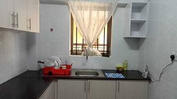 Comfort Apartment, Balcony, City View | Private kitchen | Fridge, microwave, cookware/dishes/utensils