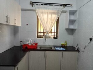 Comfort Apartment, Balcony, City View | Private kitchen