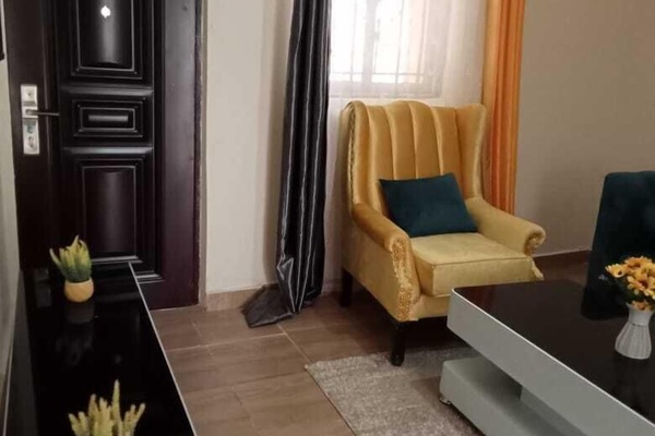 Comfort Apartment, Balcony, City View | Living area | 24-inch Smart TV with digital channels