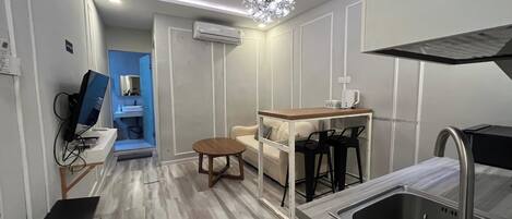 Chambre Exclusive | Coin séjour