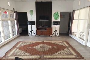 Standard Villa, 3 Bedrooms, Pool View | Living area | 32-inch LCD TV with satellite channels - Surga Family House (Cisarua)