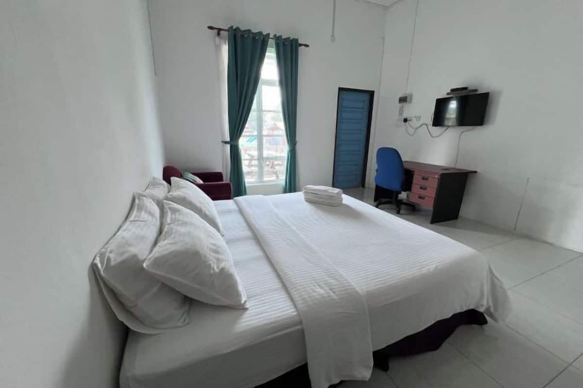 Desk, blackout curtains, iron/ironing board, bed sheets