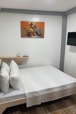 Standardzimmer | Minibar, Schreibtisch, kostenloses WLAN, Bettwäsche