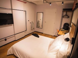 Minibar, desk, laptop workspace, blackout curtains
