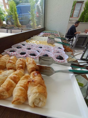 A buffet with various pastries and desserts. - Erom Otel (Trabzon)