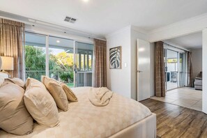 House, Multiple Beds, Non Smoking, Partial Ocean View | Desk, laptop workspace, soundproofing, iron/ironing board