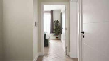 Apartment, 1 Bedroom | In-room safe, laptop workspace, soundproofing, iron/ironing board
