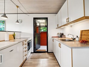 Fridge, oven, highchair, cookware/dishes/utensils