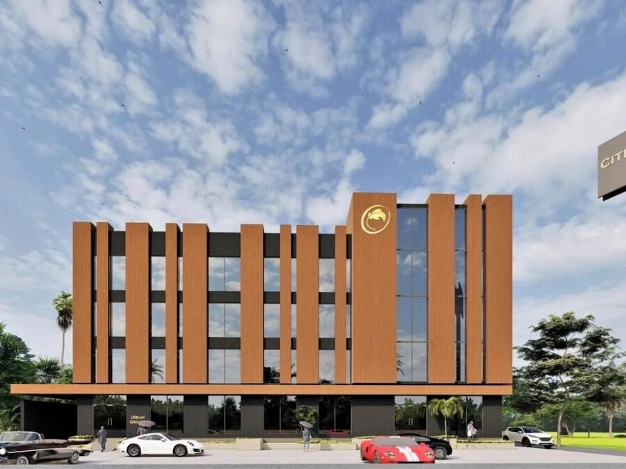 Un edificio moderno con un letrero que dice 'CITI RESIDENCIES'.
