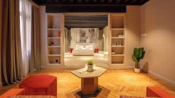 Luxury Apartment | Living area | 30-inch TV with digital channels