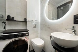 Shower, hair dryer, shampoo