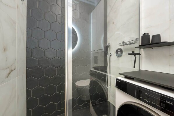 Shower, hair dryer, shampoo