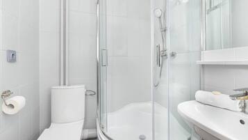 Shower, hair dryer, towels, shampoo